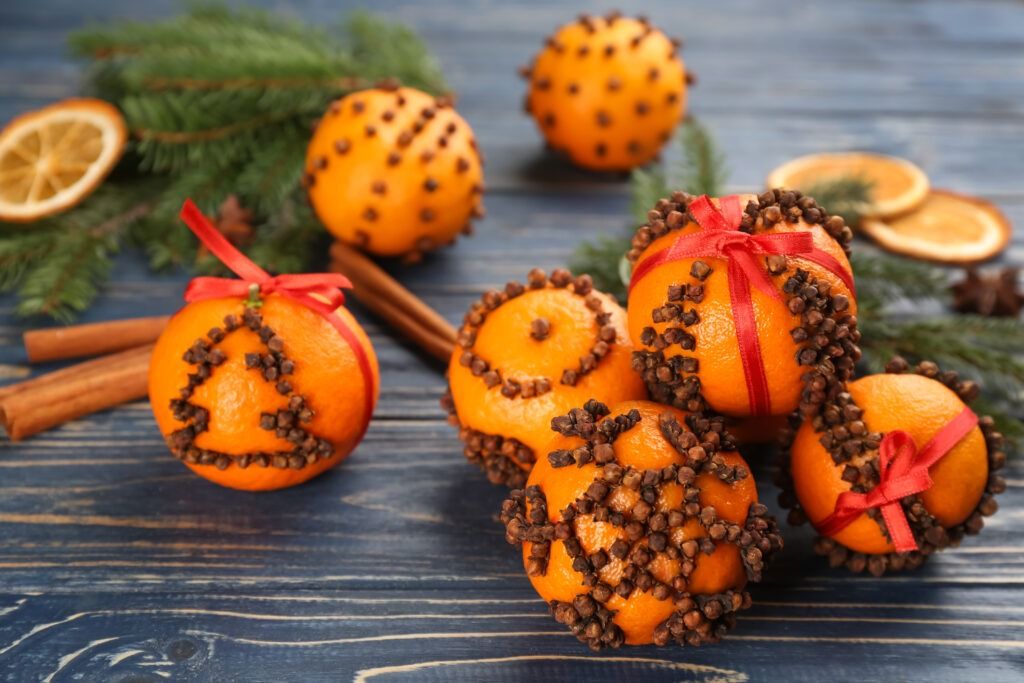 orange clove pomanders bowl christmas table decor