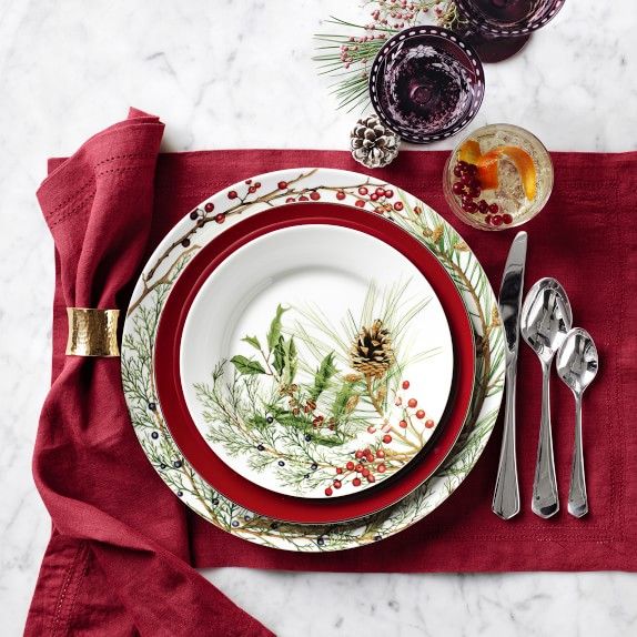 red and white christmas table setting red charger plates
